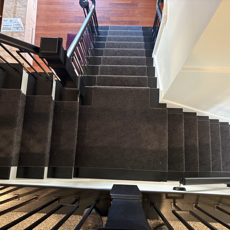 Landing and split flight after installation, with the runner centered on each tread.