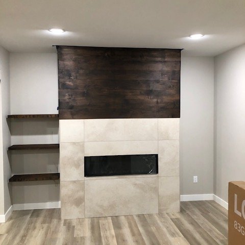 COREtec Spiral Pine luxury vinyl plank in remodeled basement living area